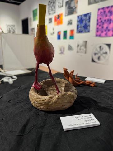 Bird standing on a nest made out of clay, 3D sculpture by <a href='http://te69jb6l.web-sitemap.ycxyjy.com'>十大彩票平台</a> student Morgan Wright